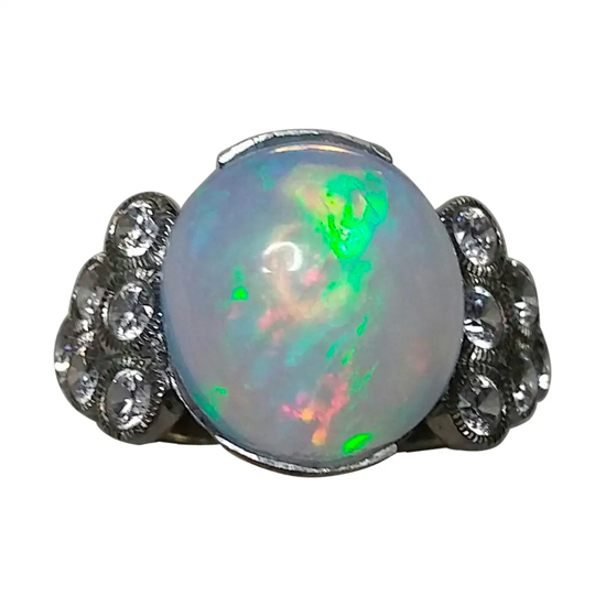 14 Kt Gold Opal 4 Carats Oval Cabochon Cocktail Ring 14 Kt Gold Opal 4 Carats Oval Cabochon Cocktail Ring